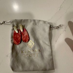 Kendra Scott drop earrings.